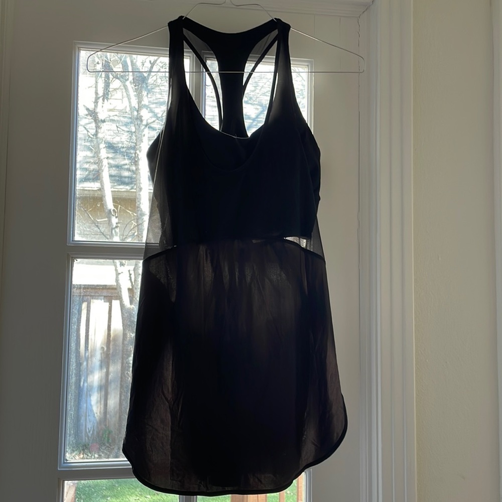 Black Lululemon athletic top with built in sports bra.